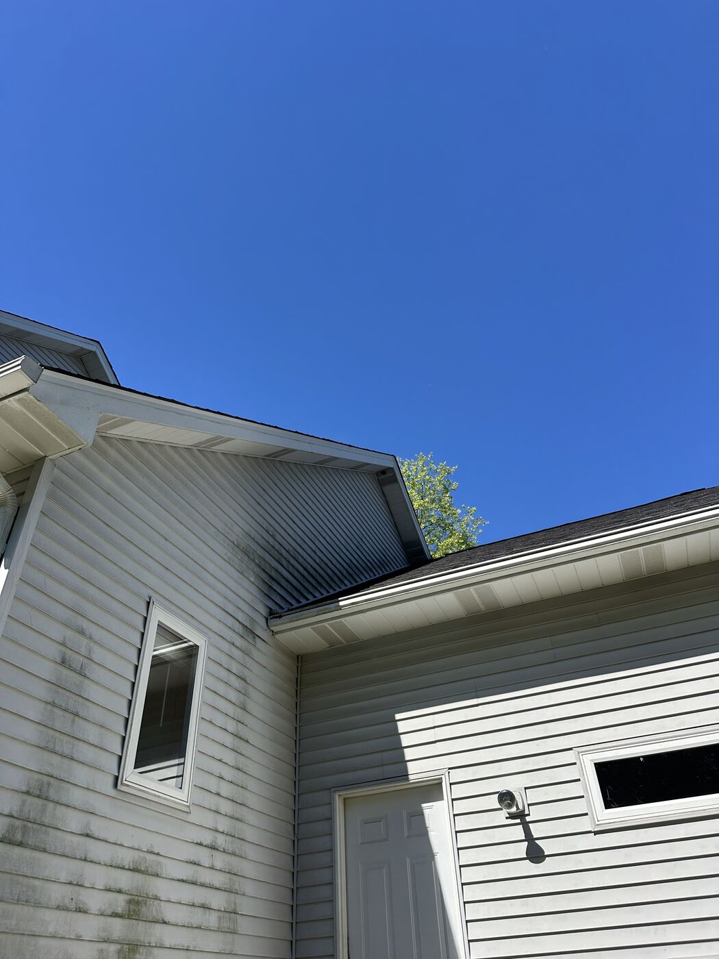 Siding before surface cleaning
