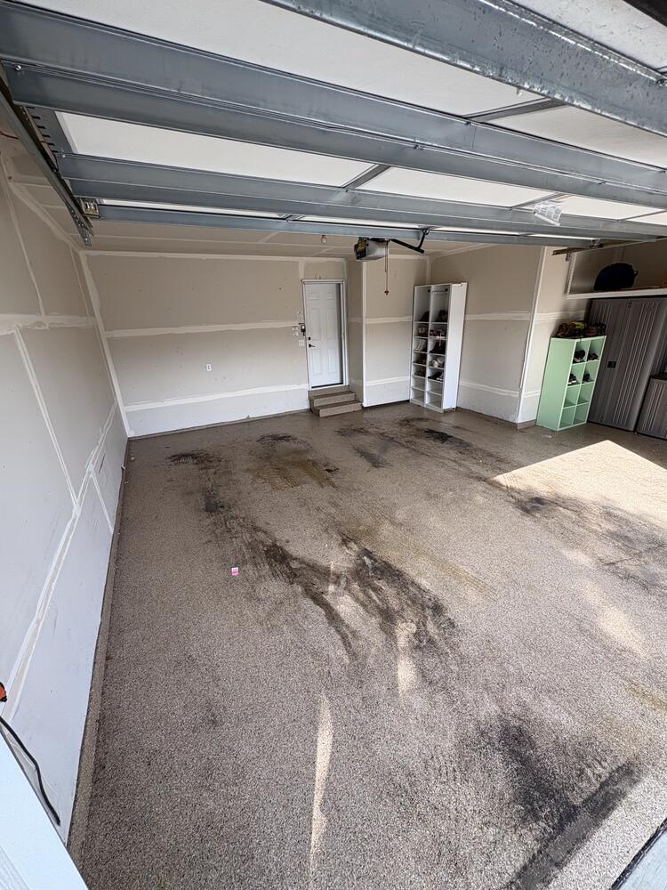 Garage floor before surface cleaning